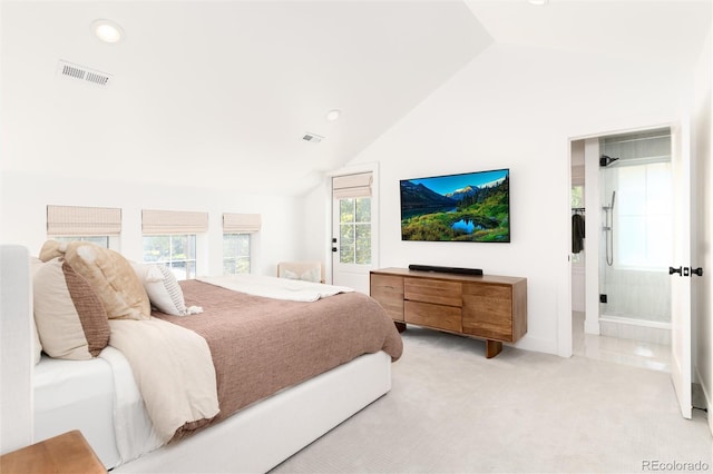 carpeted bedroom featuring vaulted ceiling