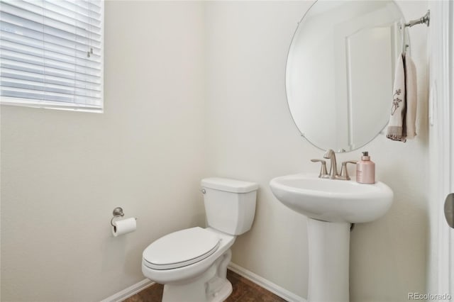 2682 E 161st Pl, Thornton, CO 80602 - bathroom with baseboards and toilet