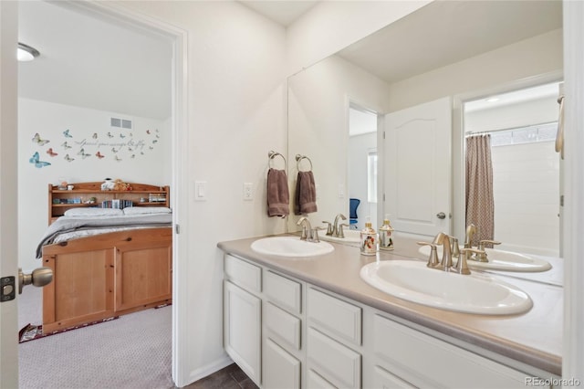 2682 E 161st Pl, Thornton, CO 80602 - bathroom featuring double vanity and a shower with curtain