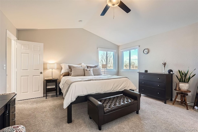 bedroom with ceiling fan, light carpet, and lofted ceiling