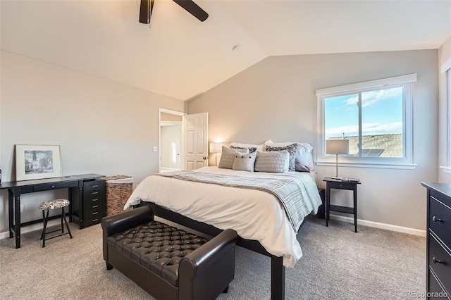 carpeted bedroom featuring ceiling fan and vaulted ceiling