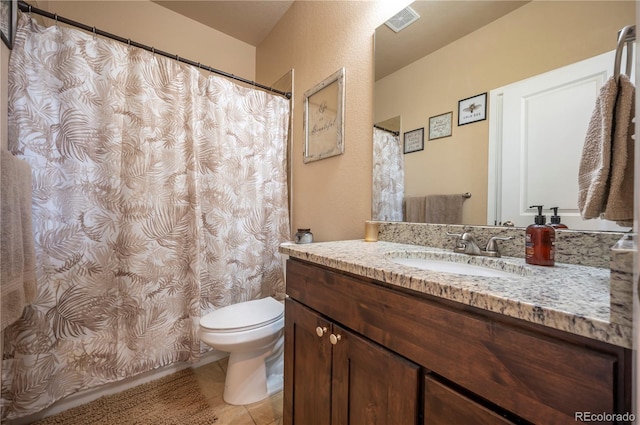 full bathroom with visible vents, tile patterned flooring, vanity, and toilet