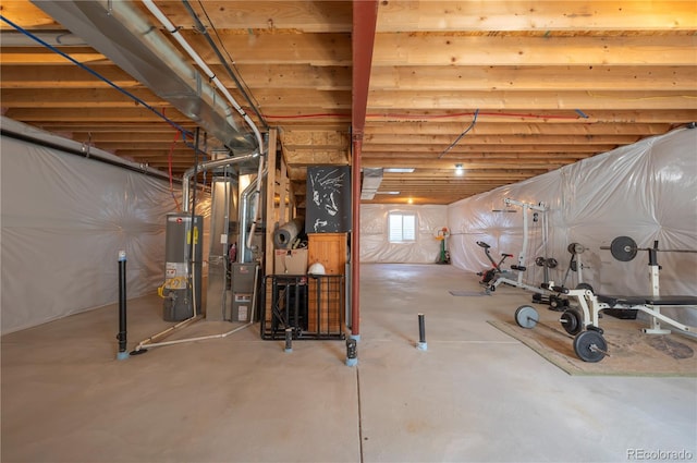 below grade area with water heater and heating unit