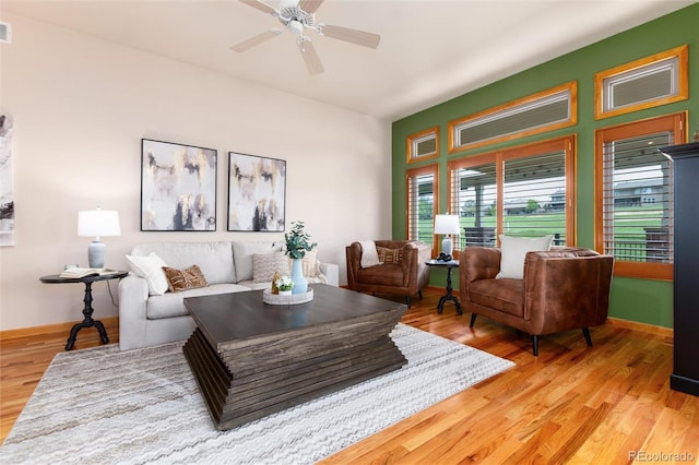 15851 Deer Ridge Dr, Morrison, CO 80465 - living room with ceiling fan, wood finished floors, and baseboards
