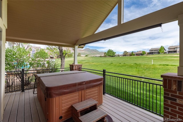 15851 Deer Ridge Dr, Morrison, CO 80465 - wooden deck featuring a hot tub, a yard, and a mountain view