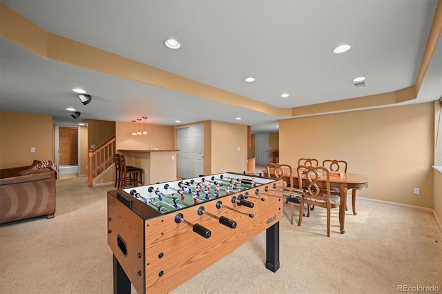 1120 N Calhan Ave, Castle Rock, CO 80104 - recreation room with light colored carpet, baseboards, and recessed lighting