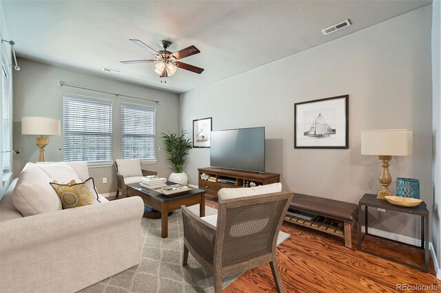 8883 White Prairie Vw, Colorado Springs, CO 80924 - living room featuring ceiling fan and baseboards
