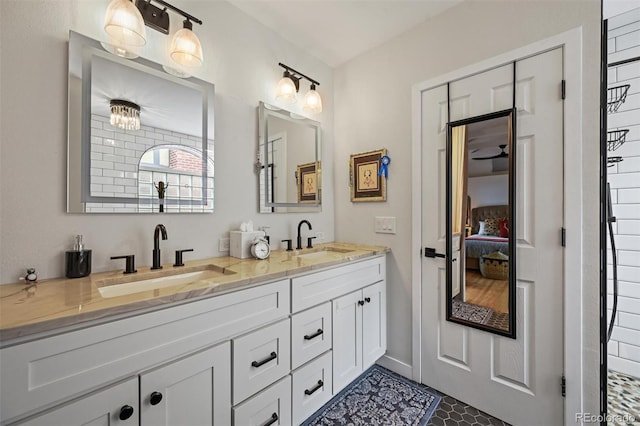 1414 S Vine St, Denver, CO 80210 - full bath featuring double vanity, ensuite bathroom, and tile patterned flooring
