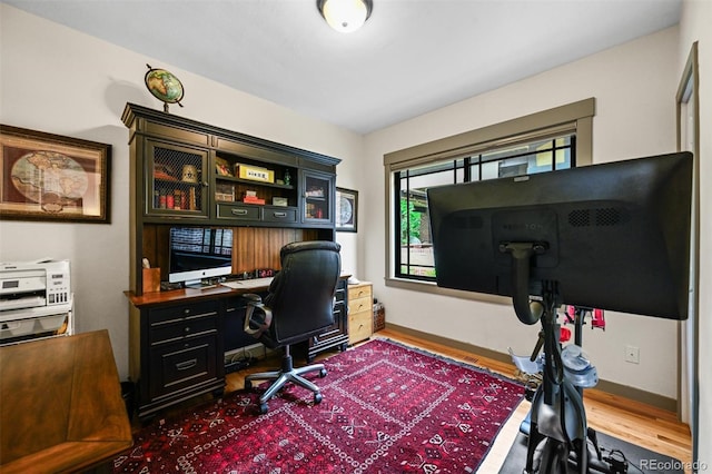 1414 S Vine St, Denver, CO 80210 - home office with wood finished floors and baseboards