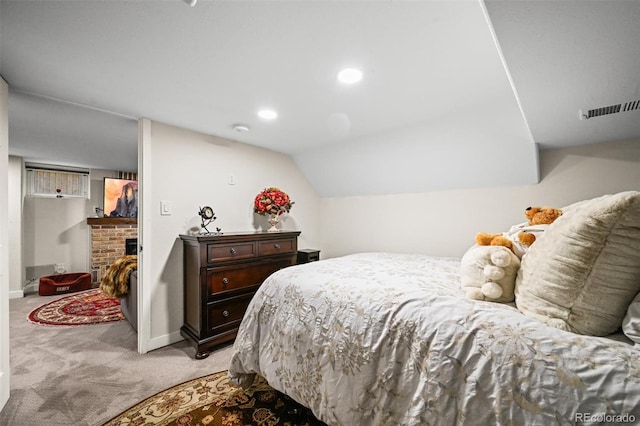 1414 S Vine St, Denver, CO 80210 - bedroom featuring light colored carpet, lofted ceiling, a fireplace, and recessed lighting