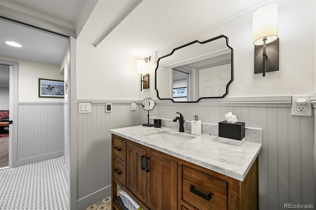 1414 S Vine St, Denver, CO 80210 - bathroom with wainscoting and vanity