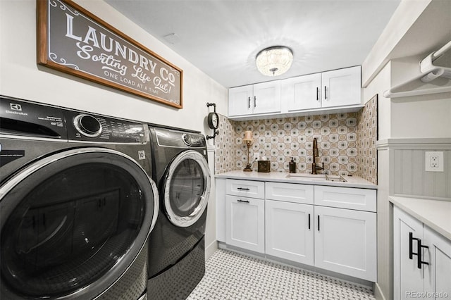1414 S Vine St, Denver, CO 80210 - laundry room featuring washer and dryer and cabinet space