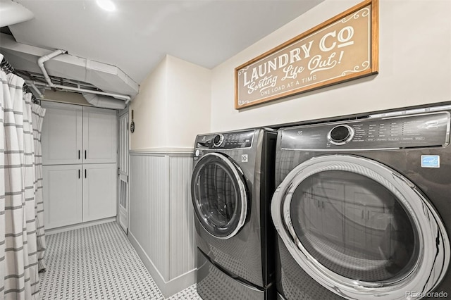 1414 S Vine St, Denver, CO 80210 - washroom featuring washer and dryer and wainscoting