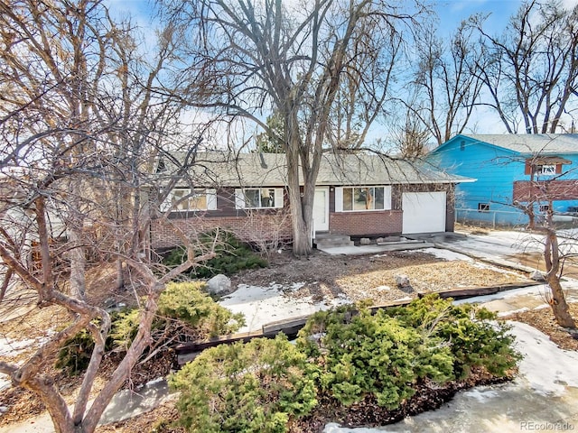 single story home featuring a garage