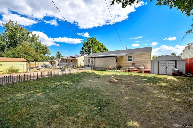 1822 N Circle Dr, Colorado Springs, CO 80909 - back of property featuring a storage shed and an outbuilding