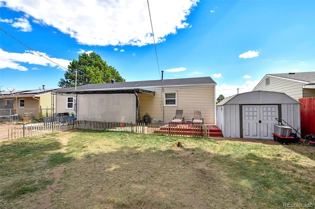 1822 N Circle Dr, Colorado Springs, CO 80909 - back of house with a shed and an outdoor structure