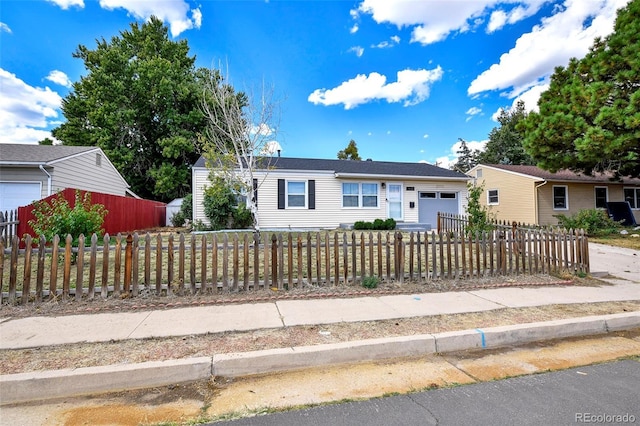 1822 N Circle Dr, Colorado Springs, CO 80909 - single story home with a garage and a fenced front yard