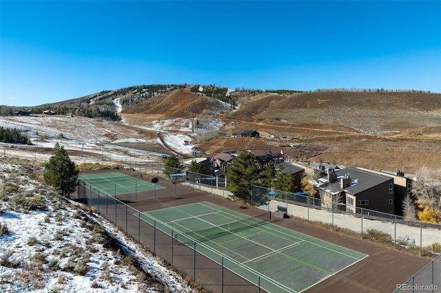 view of sport court with a mountain view