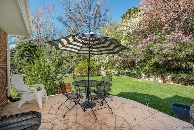 view of patio featuring outdoor dining space