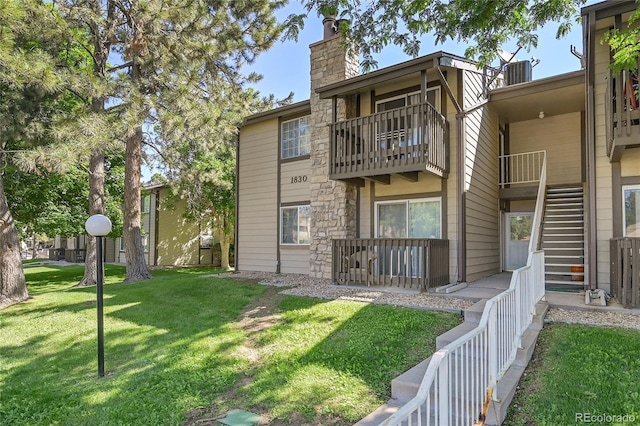 1830 S Pitkin Cir Unit B, Aurora, CO 80017 - view of building exterior featuring stairway