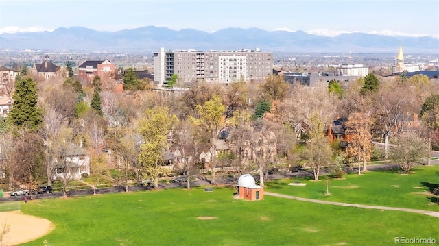 surrounding community with a mountain view