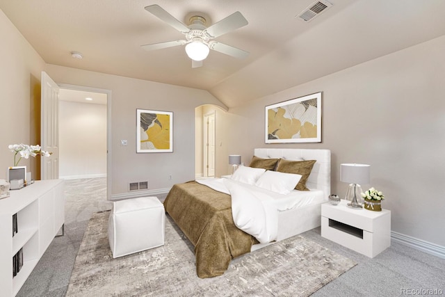 bedroom featuring lofted ceiling, ceiling fan, and carpet flooring