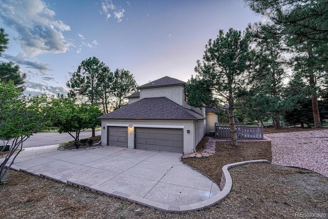 view of property exterior at dusk