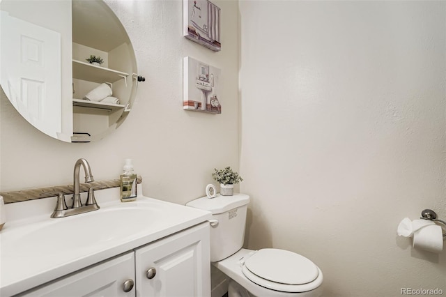 15775 E 13th Pl, Aurora, CO 80011 - bathroom featuring vanity and toilet