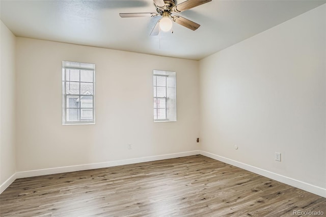 15775 E 13th Pl, Aurora, CO 80011 - empty room with wood finished floors and ceiling fan