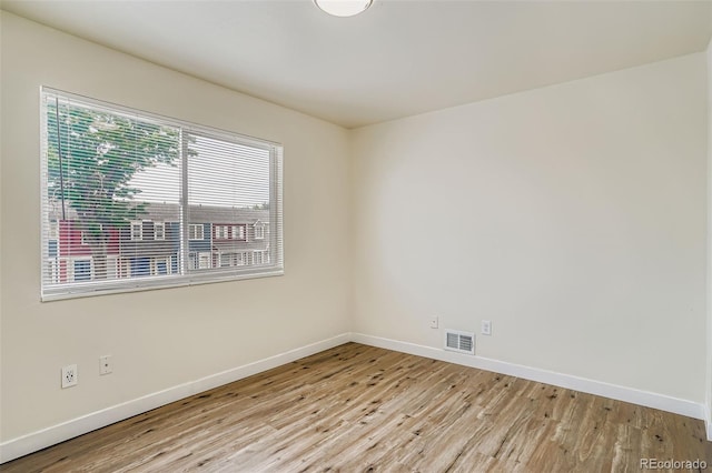 15775 E 13th Pl, Aurora, CO 80011 - empty room with baseboards and light wood-type flooring