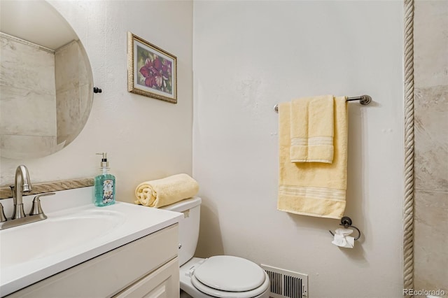 15775 E 13th Pl, Aurora, CO 80011 - bathroom featuring vanity and toilet