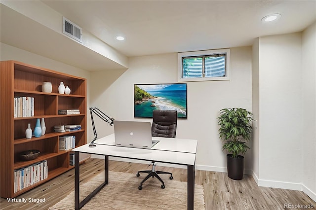 15775 E 13th Pl, Aurora, CO 80011 - home office featuring light wood-style flooring and recessed lighting