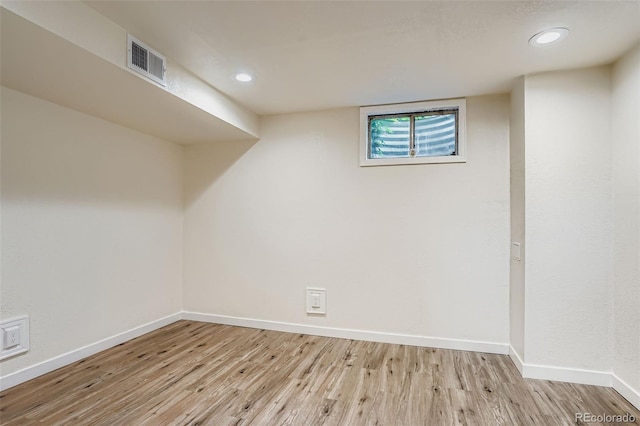 15775 E 13th Pl, Aurora, CO 80011 - basement with wood finished floors and recessed lighting