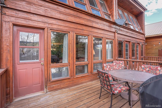 wooden deck with area for grilling