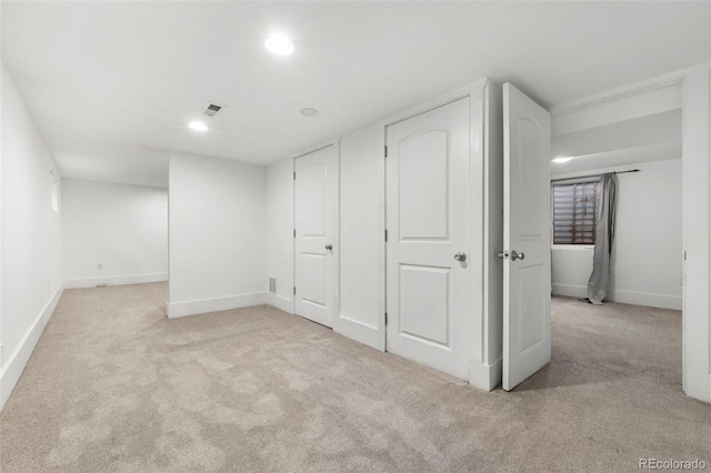 basement with light carpet