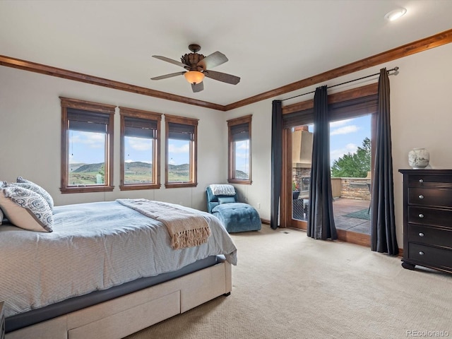 17121 Snow Creek Ln, Morrison, CO 80465 - bedroom with access to exterior, carpet floors, crown molding, and a ceiling fan