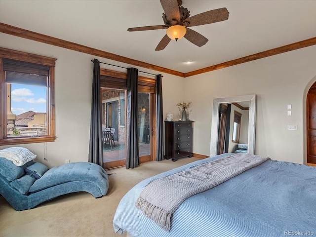 17121 Snow Creek Ln, Morrison, CO 80465 - bedroom featuring arched walkways, light carpet, access to outside, ceiling fan, and ornamental molding