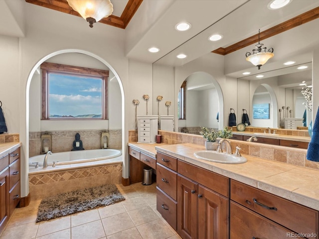 17121 Snow Creek Ln, Morrison, CO 80465 - full bath featuring tile patterned floors, vanity, a bath, recessed lighting, and crown molding