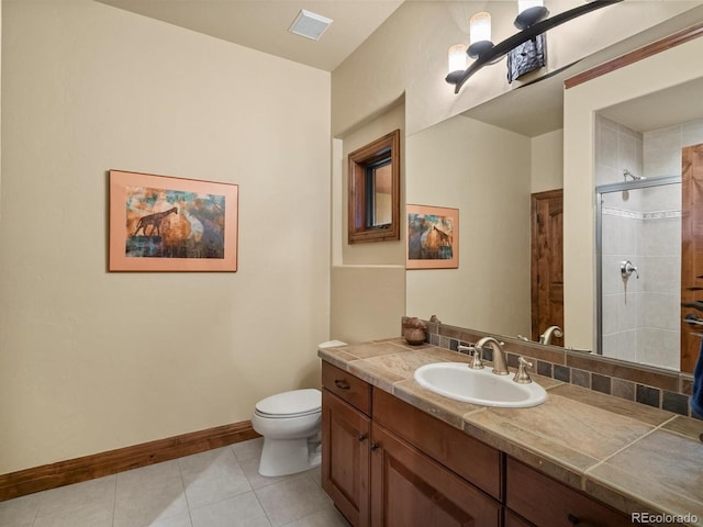 17121 Snow Creek Ln, Morrison, CO 80465 - full bathroom featuring vanity, tile patterned flooring, and a shower stall