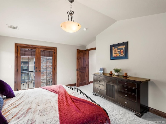 17121 Snow Creek Ln, Morrison, CO 80465 - bedroom with access to outside, light carpet, vaulted ceiling, and french doors