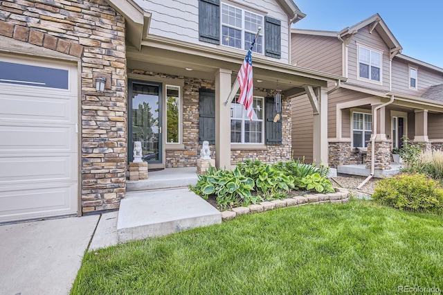853 Jenny Ln, Berthoud, CO 80513 - property entrance featuring stone siding and covered porch