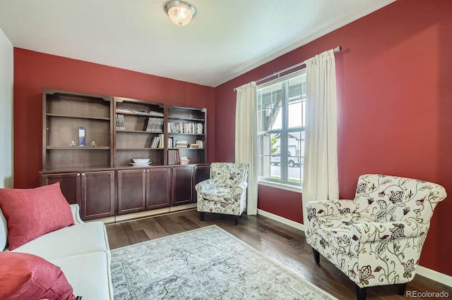 853 Jenny Ln, Berthoud, CO 80513 - living area featuring dark wood-style floors and baseboards