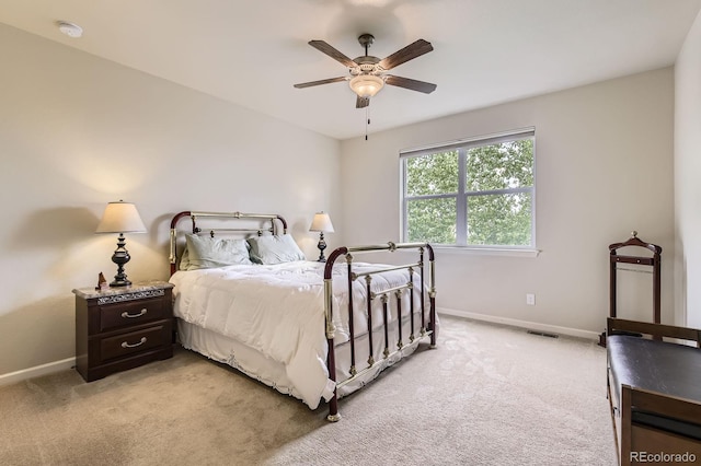 853 Jenny Ln, Berthoud, CO 80513 - bedroom with baseboards, light colored carpet, and a ceiling fan