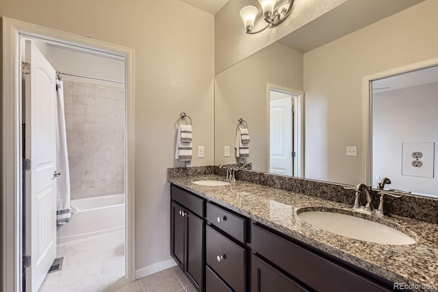 853 Jenny Ln, Berthoud, CO 80513 - full bathroom with double vanity, tile patterned flooring, shower / bathtub combination with curtain, and baseboards