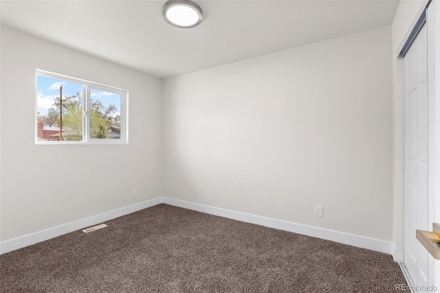 7961 Granada Rd, Denver, CO 80221 - empty room with dark carpet and baseboards