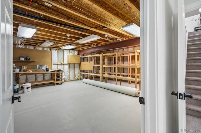 5569 Willow Springs Dr, Morrison, CO 80465 - unfinished basement featuring stairway