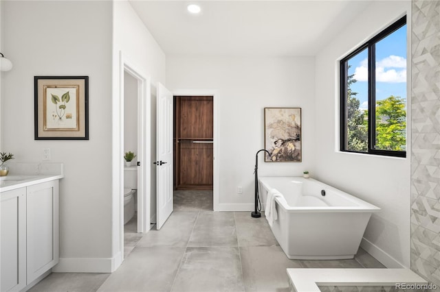 5569 Willow Springs Dr, Morrison, CO 80465 - bathroom featuring a freestanding tub and vanity