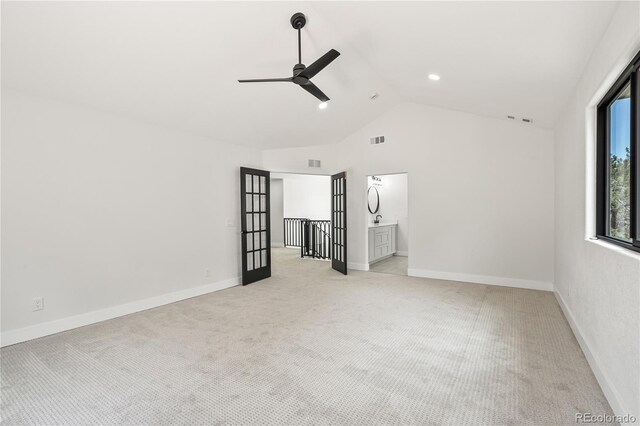 5569 Willow Springs Dr, Morrison, CO 80465 - unfurnished bedroom with light colored carpet, high vaulted ceiling, and ceiling fan
