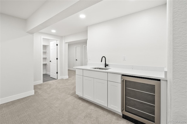 5569 Willow Springs Dr, Morrison, CO 80465 - bar area with beverage cooler, light colored carpet, and recessed lighting