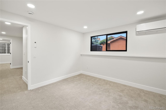 5569 Willow Springs Dr, Morrison, CO 80465 - spare room featuring a wall mounted air conditioner, carpet, recessed lighting, and a smoke detector